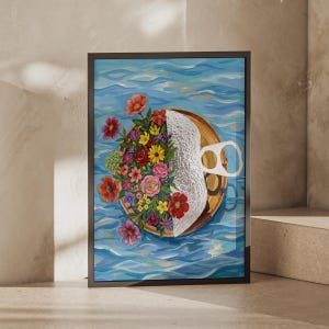 May include: A framed rectangular print featuring a painting of a metallic tin can floating on blue water. The can is partially opened with a white lid and is overflowing with a vibrant arrangement of colourful flowers in shades of red, pink, and yellow.