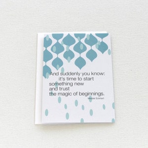 May include: A white card with a blue and white geometric pattern at the top. The card has a quote that reads "And suddenly you know: it's time to start something new and trust the magic of beginnings. - Meister Eckhart"