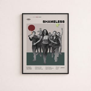 May include: A framed poster for the television show Shameless, featuring a black and white group photograph of the cast against a beige and dark green background. The title Shameless is printed in bold black text at the top with show details below.