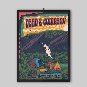 May include: A framed concert poster for Dead & Company featuring a mountain landscape, a tent, a campfire, and a dancing bear. The text reads Dead & Company and June 17, 2022 - Folsom Field - Boulder, Co. The color palette includes orange, blue, and green.