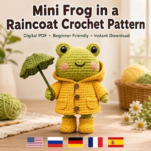 May include: A crochet frog toy wearing a yellow hooded raincoat with three brown buttons and matching yellow boots. The frog holds a green crochet umbrella. The text reads: Mini Frog in a Raincoat Crochet Pattern, Digital PDF, Beginner Friendly, Instant Download.