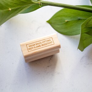 Wear Snug Fitting Rubber Stamp