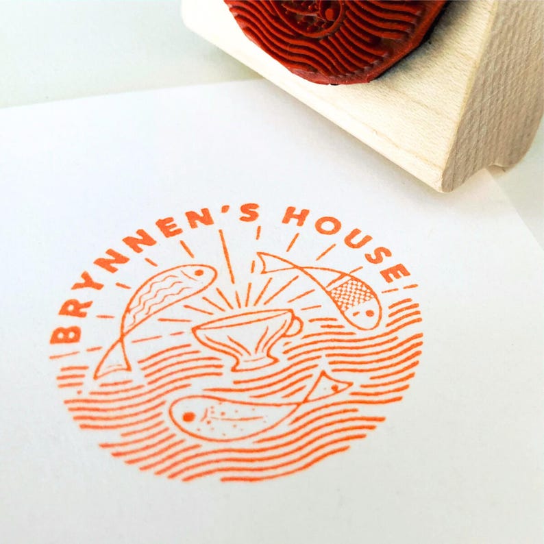 May include: Orange rubber stamp with the text "BRYNEN'S HOUSE" in a circle. Inside the circle is a stylised image of a bowl with three fish swimming around it.