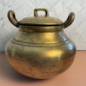 Antique heavy brass cooking or ceremonial pot with lid, handcrafted in Nepal.
