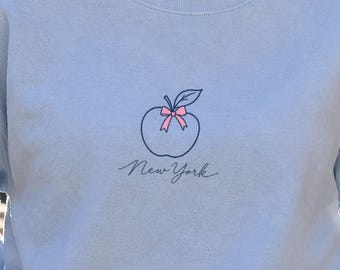 Big Apple Sweatshirt, Pink Bow New York Crewneck, Coquette NYC Sweater, New York Gift for Her, NYC Travel Cozy Sweatshirt