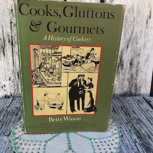 Vintage Cookbook. Vintage Cooking History. Humor. Art. Recipes. Historical references. Book with jacket