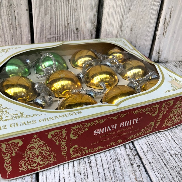 Vintage Shiny Bright Ornaments. Boxed gold and green Shiny Bright Christmas ornaments.