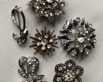 Vintage Rhinestone Brooches. 6 costume jewelry brooches. Clear Rhinestones