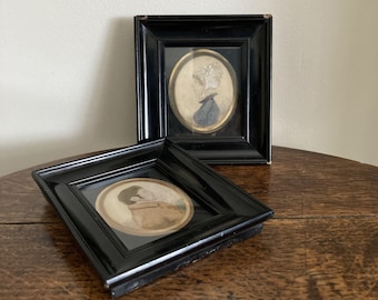 Antique pair of framed Georgian watercolour portrait miniatures of a husband and wife. c. early 19th century