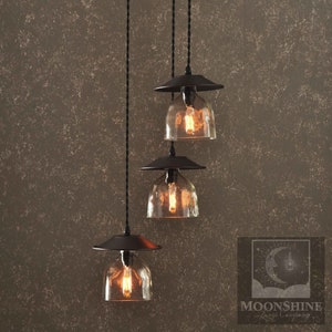 The Serenity 3-Light Patron Tequila Bottle Chandelier With Customizable Metal Finish and Vintage Style Edison Lightbulbs
