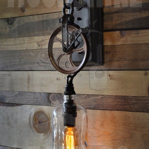 The Industriale Wall Sconce Clear Growler Bottle Pulley Sconce image 1