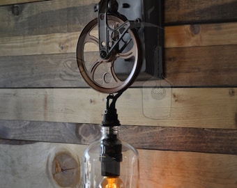 The Industriale Wall Sconce - Clear Growler Bottle Pulley Sconce