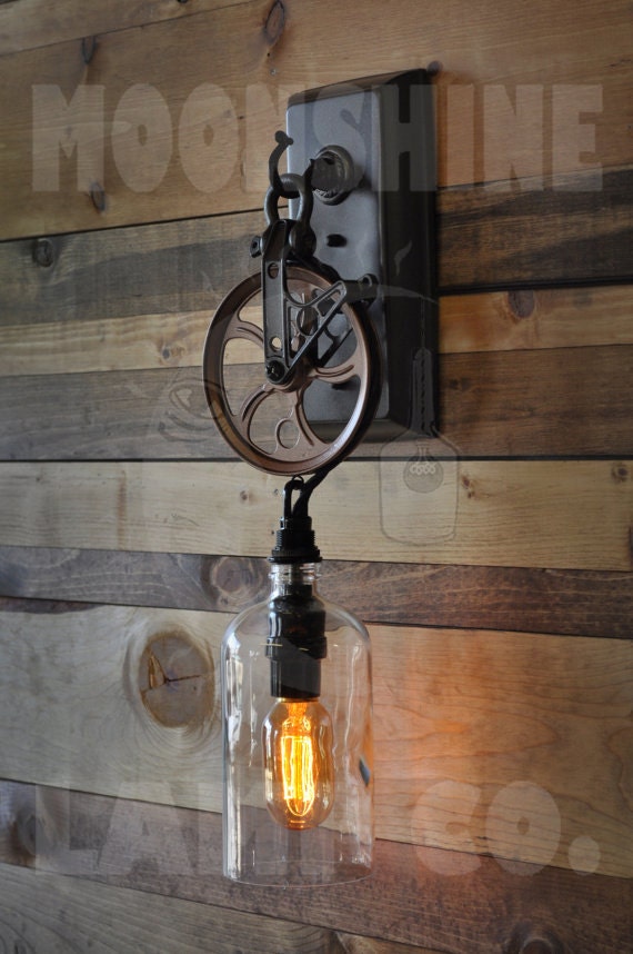 The Industriale Wall Sconce - Clear Growler Bottle Pulley Sconce