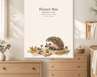 May include: A rectangular wall art print on a cream background featuring a watercolor illustration of a hedgehog, oak leaves, acorns, and mushrooms. Text reads: Eleanor Mae, September 16, 2026, 6:42 AM, 7 lb 4 oz, 20.5 in, AUSTIN, TEXAS.