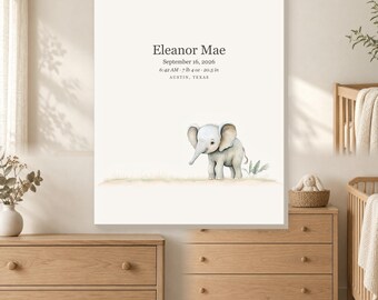 May include: A rectangular wall art print featuring a watercolor illustration of a baby elephant standing on a grassy patch. The text reads: Eleanor Mae, September 16, 2026, 6:42 AM, 7 lb 4 oz, 20.5 in, and AUSTIN, TEXAS, in a dark grey serif font.