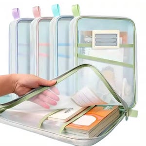 May include: A set of four rectangular, semi-transparent mesh document organizers with zippered closures. Each organizer features a colored fabric trim in purple, pink, blue, or green, and includes a small rectangular label window on the front.