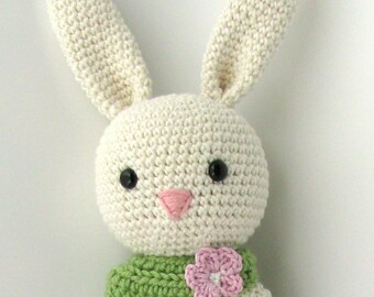 Crochet rabbit amigurumi doll dressed in pink tulle skirt.  Stuffed bunny Easter gift for girl.