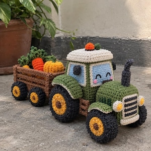 May include: A crocheted green tractor with a light blue windshield, black wheels with yellow centers, and a brown trailer filled with crocheted orange carrots, green leafy tops, and a yellow pumpkin. The tractor features a smiling face.