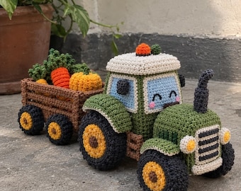 May include: A crocheted green tractor with a light blue windshield, black wheels with yellow centers, and a brown trailer filled with crocheted orange carrots, green leafy tops, and a yellow pumpkin. The tractor features a smiling face.