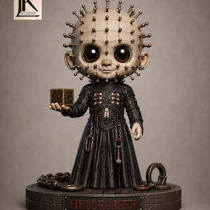 May include: A stylized figurine of a pale, bald character with numerous metal pins protruding from the head, wearing a black textured robe with leather-like straps. The figure holds a small gold-etched cube and stands on a base labeled HELLRAISER.