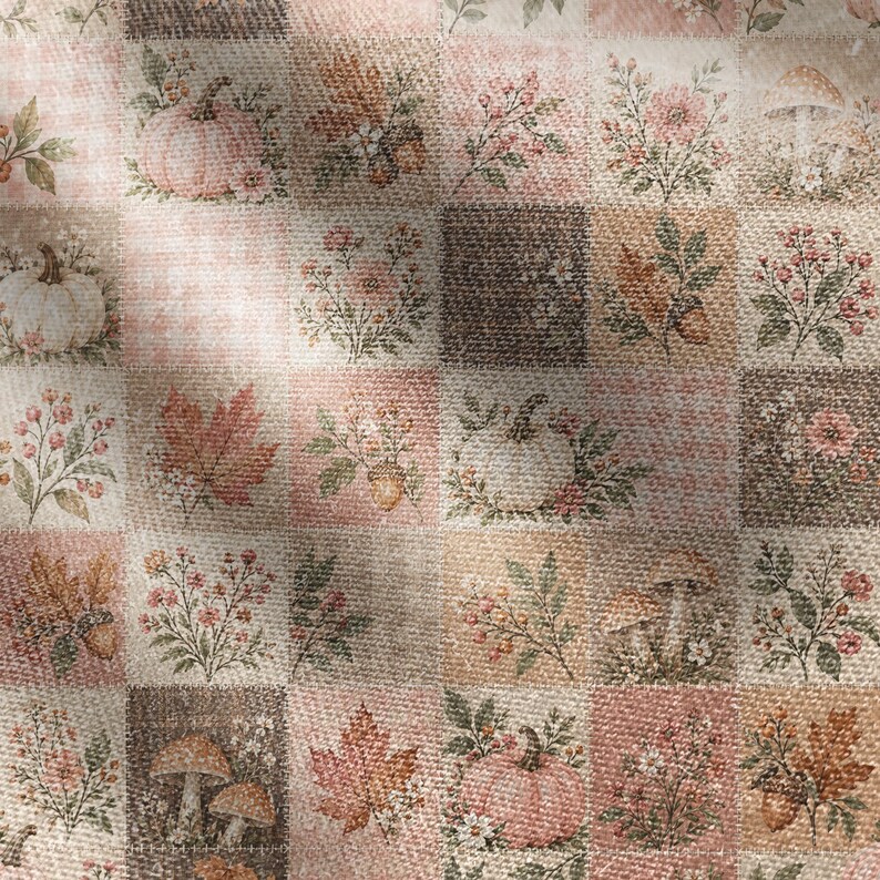 May include: A fabric featuring a repeating patchwork grid pattern with autumn-themed illustrations. The squares display pumpkins, mushrooms, maple leaves, acorns, and floral arrangements in muted shades of pink, brown, orange, and cream.