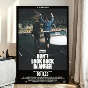 May include: A movie poster for Oasis: Don't Look Back in Anger featuring two people on a stage facing a large crowd. The text reads THE GREAT WAIT IS OVER, oasis, DON'T LOOK BACK IN ANGER, IN THEATERS AND IMAX, and the date 09.11.26.