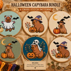 May include: A collection of six circular wooden embroidery hoops containing cross stitch patterns of capybaras in Halloween costumes, including ghosts, witch hats, and pumpkins. The text reads HALLOWEEN CAPYBARA BUNDLE 6 CROSS STITCH PATTERNS.