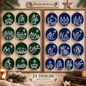 Könnte beinhalten: Eine Sammlung von 24 runden Stickrahmen mit weißen Kreuzstich-Krippenszenen auf dunkelgrünem und dunkelblauem Stoff. Die Darstellung ist in zwei Holzrahmen unterteilt, wobei der Text WonderByStitch und 24 DESIGNS NATIVITY CROSS STITCH PATTERN SET zu sehen ist.