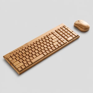 May include: A computer keyboard and a computer mouse, both constructed from light brown wood. The keyboard features a standard QWERTY layout with wooden keys, and the mouse has a smooth, contoured shape with two buttons and a central scroll wheel.