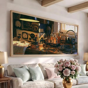 May include: A rectangular wall art print depicting a vintage electronics workbench with analog radio equipment, glowing vacuum tubes, a soldering iron, coiled black cables, and headphones, all illuminated by a warm overhead lamp light.
