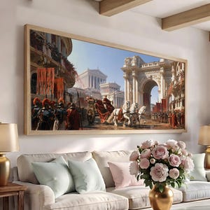 May include: A rectangular wall art print in a light wood frame depicting a Roman triumphal procession. The scene features soldiers in armor, red banners, a horse-drawn chariot, and classical stone architecture with arches and columns.