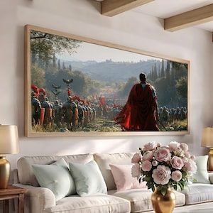 May include: A rectangular wall art print in a light wood frame depicting a Roman general in a red cloak standing before a large legion of soldiers in armour. The scene features a landscape with trees, hills, and a bright sky in the background.