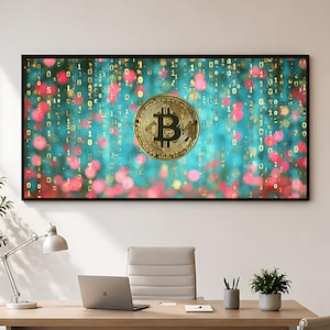 May include: A rectangular wall art piece featuring a centred gold Bitcoin symbol against a teal background filled with cascading gold binary code digits and soft-focus pink circular bokeh light effects, all enclosed in a thin black frame.