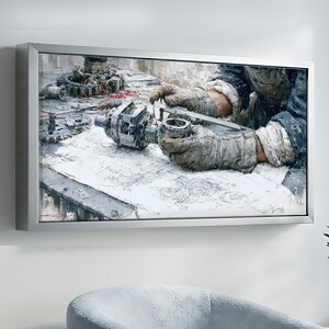 May include: A framed wall art print depicting a close-up of gloved hands using a metal calliper to measure a mechanical gear component. The scene includes technical blueprints, various metal gears, and industrial tools on a workbench in shades of grey.