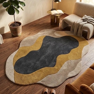 Handgetuft abstract golvend vloerkleed in houtskoolgeel beige met organische vormen en onregelmatige patronen, modern vloerkleed voor de woonkamer, kunstzinnige decoratie voor in huis.