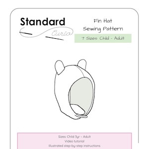 May include: A black and white line drawing of a fin hat sewing pattern. The pattern includes 7 sizes for children and adults. The text "Standard" and "Curia" are visible in the image. The text "Fin Hat Sewing Pattern" is also visible in the image.