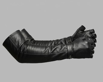 May include: A pair of black leather fingerless gloves extending to the elbow. The gloves feature a smooth finish, a fitted silhouette, and a horizontal strap across the wrist secured with a small metal snap button closure.