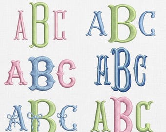 May include: Fishtail monogram embroidery fonts in 7 sizes, featuring various letter A, B, and C designs in pink, light green, and blue thread colors. The text reads FISHTAIL MONOGRAM EMBROIDERY FONTS and BX, PES, DST, EXP + 7 FORMATS.