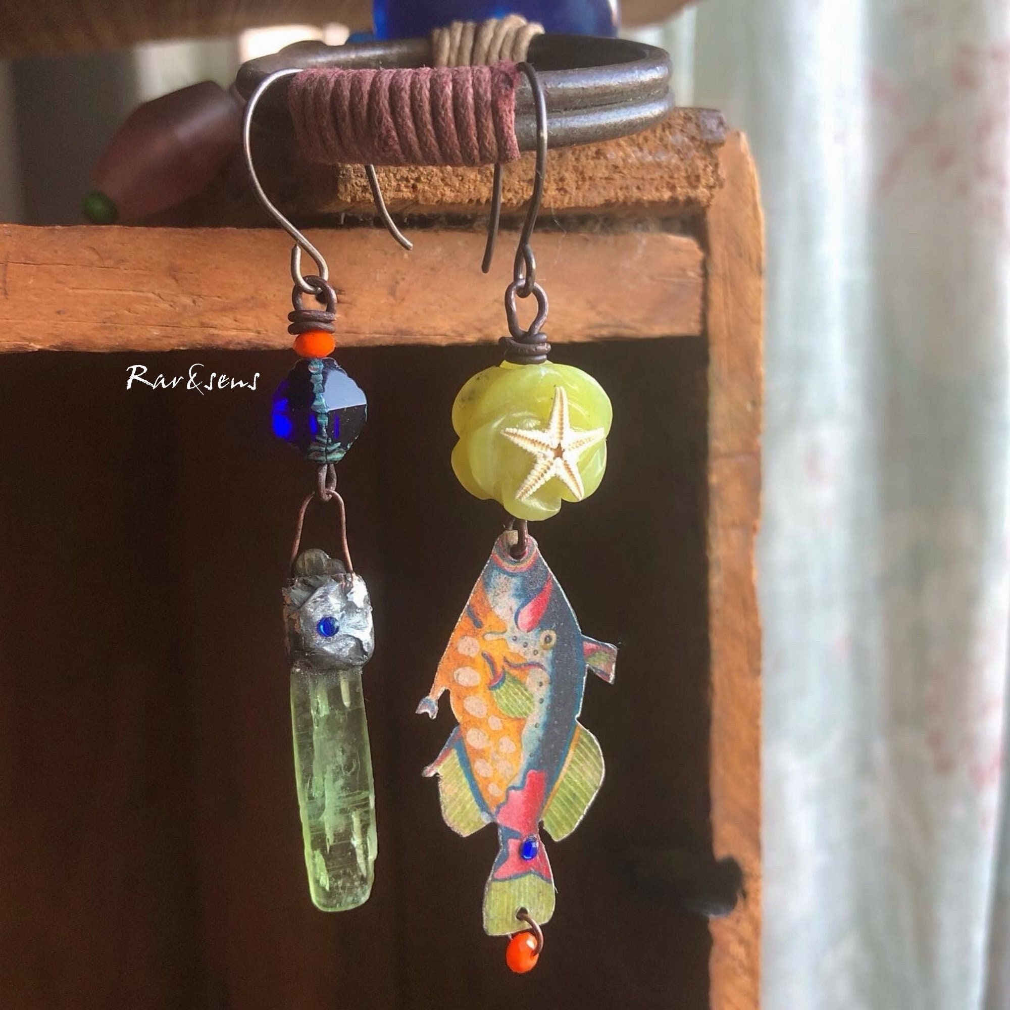 Asymmetrical handcrafted earrings,h