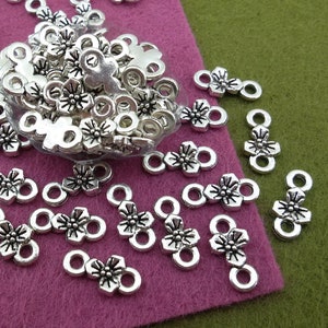 mały srebrny łącznik, kwiatowe zdobienie biżuterii, kwiatowa ozdoba do kolczyków, srebrne zdobienie biżuterii, małe ogniwo łańcuszka
