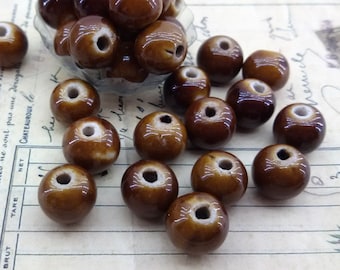 brown ceramic beads,bulk price ceramic beads,big hole ceramic beads,ceramic glazed brown beads,brown porcelain beads,rustic ceramic beads