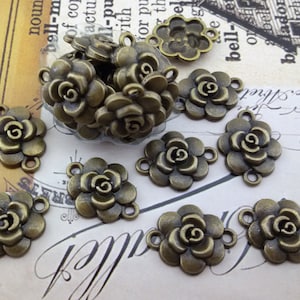 Connectors Antique bronze,vintage floral embelishment,small metal flower adornment,antique tone metal flower for Earrings,rose flower Links