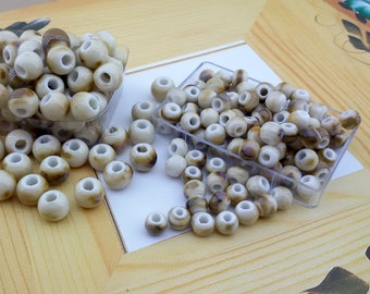 beige ceramic beads,bulk price ceramic beads,big hole ceramic beads,ceramic glazed beads,light brown porcelain beads,beige ceramic beads