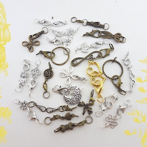 chiusure per collana in tonalità miste, chiusura decorativa per bracciale in bronzo e argento antico, chiusura a moschettone per bracciale e collana, fermaglio per collana con dettagli fantasiosi