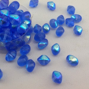blue czech glass beads,blue glass beads,blue czech beads,8 mm oval fire polished beads,czech beads,oval czeh small beads,faceted czech beads