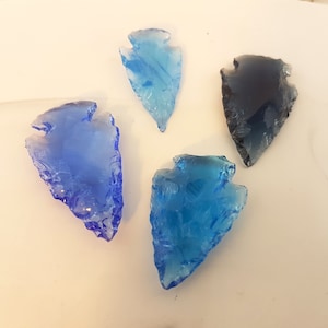 blue crystal arrowhead,transparent raw quartz arrowhead,blue clear arrowhead shape,carved crystal arrowhead,wire wrap arrowhead,quartz arrow