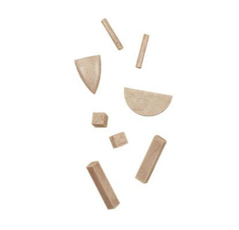 May include: A set of wooden geometric shapes in various sizes and forms, including a triangle, a semi-circle, a square, and rectangular pieces. The shapes are light brown in color and have a natural wood grain.