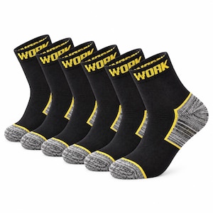 May include: A set of six black crew socks featuring the word WORK in yellow text on the ribbed cuffs. The socks have grey heathered toe and heel sections, with thin yellow accent lines bordering the grey areas on the foot and ankle.