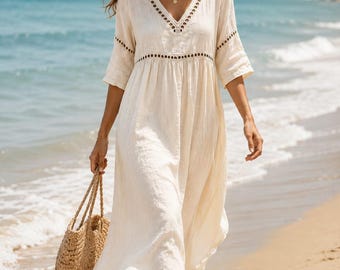 Robe midi en coton et lin à col en V, style bohème, coupe trapèze ajourée, idéale pour les vacances d'été.