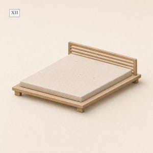 May include: A miniature wooden bed frame with a slatted headboard and a light beige mattress. The frame is low to the ground with four small feet. The Roman numeral XII is printed in the upper left corner of the image in a small square box.